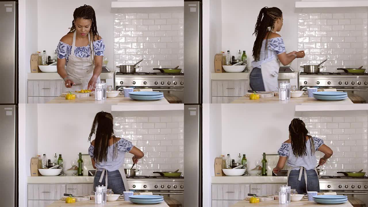 在R3D上拍摄的女性在家切碎和烹饪食材的前视图