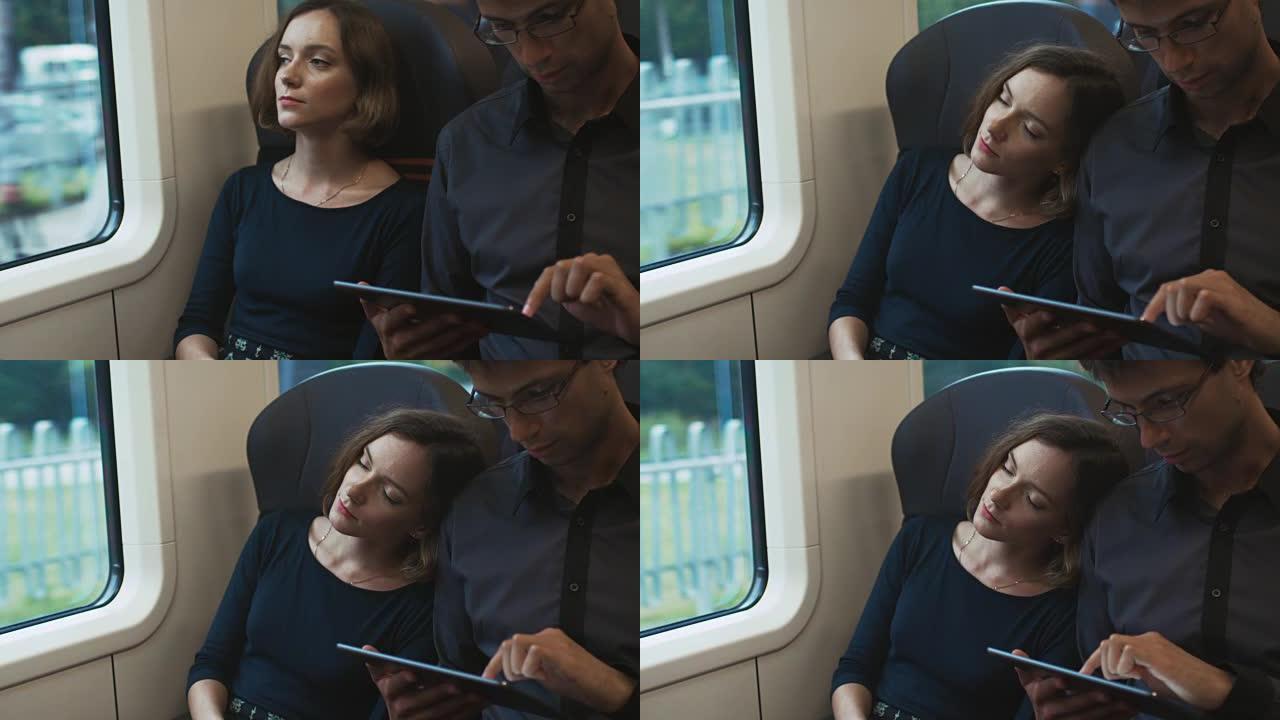 女人在火车旅行时睡着了