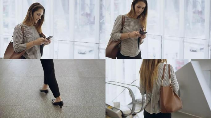 年轻漂亮的女商人在办公楼里使用智能手机。忙碌的女性在自动扶梯上往下走