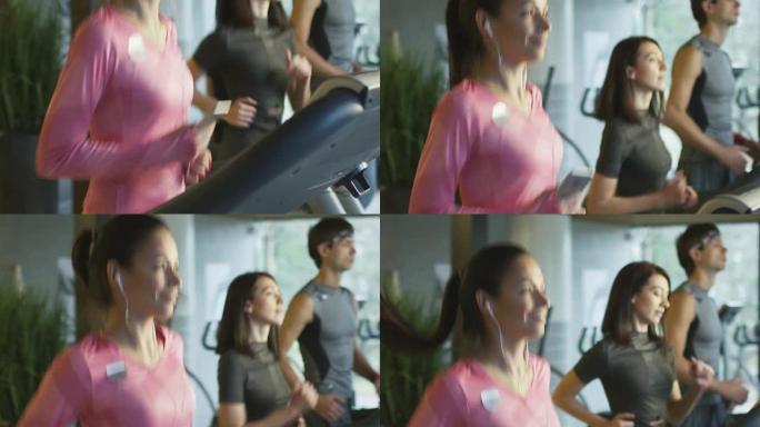 有吸引力的高加索女孩在运动健身房用耳机在跑步机上跑步的慢动作镜头。