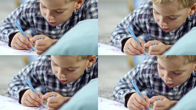 男孩用记号笔画画