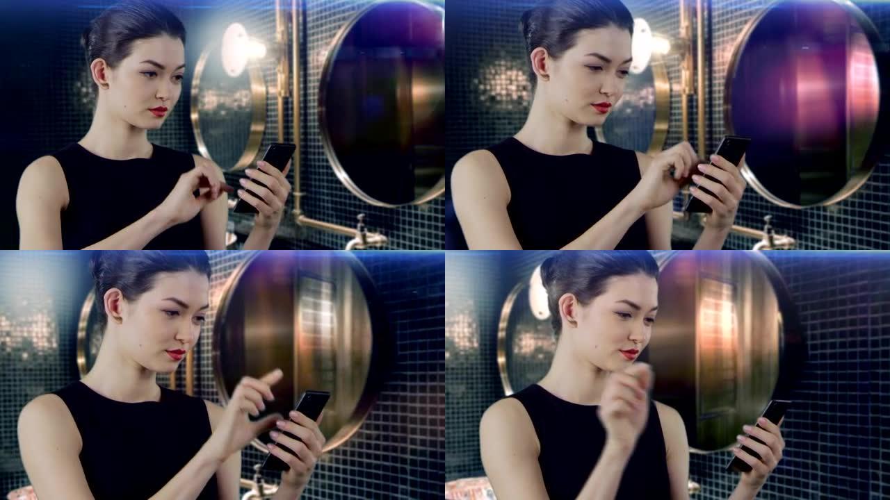 亚洲女商人在优雅的浴室使用智能手机