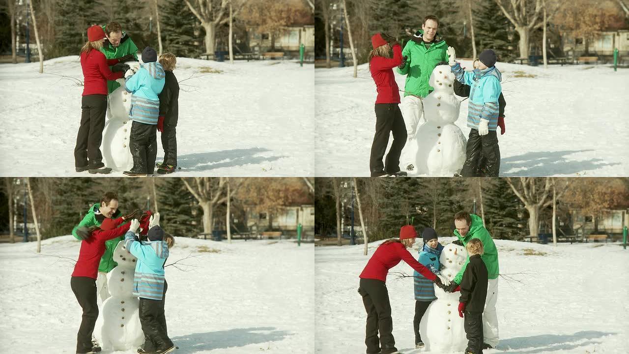 一家人堆雪人堆雪人亲子互动亲子教育