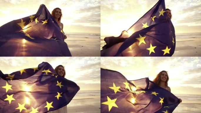 快乐的女人挥舞着欧洲国旗