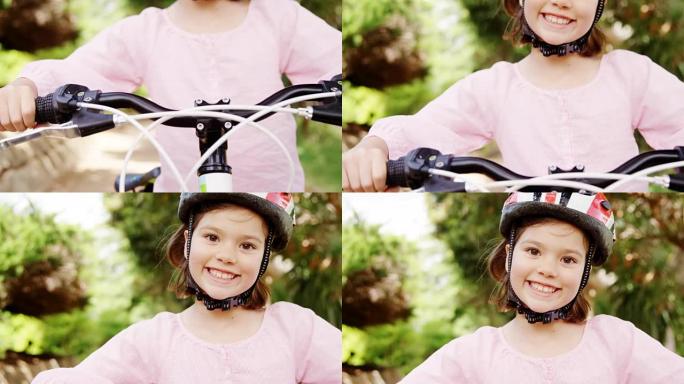 公园里站着自行车的微笑女孩的肖像