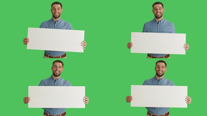 一个微笑的时尚男人拿着海报/标语牌的中景照片。在绿色屏幕上拍摄。
