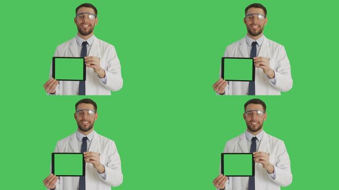 一位英俊的科学家戴着防护眼镜，手持绿色屏幕的平板电脑。背景是绿色屏幕。