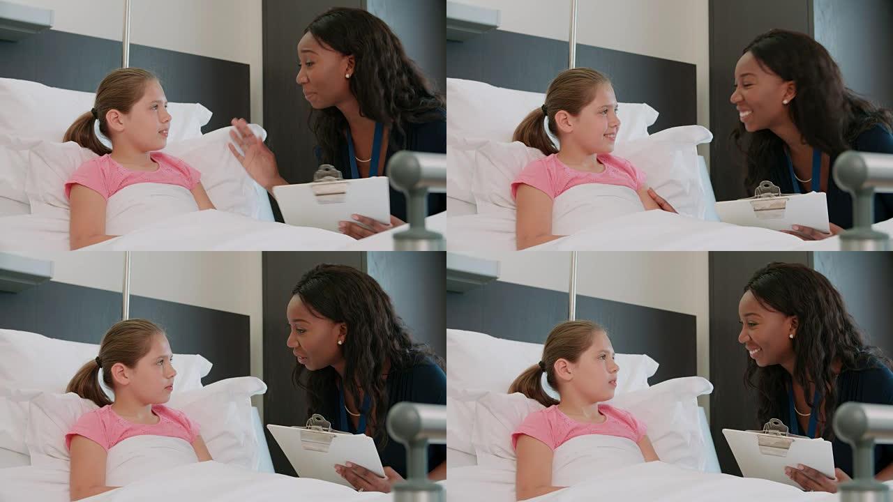 卧床儿童患者在医院病房与医生交谈