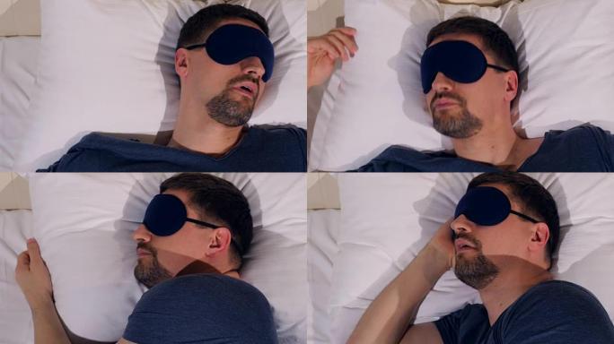 戴着睡眠面具的男人患有失眠的肖像。4K。