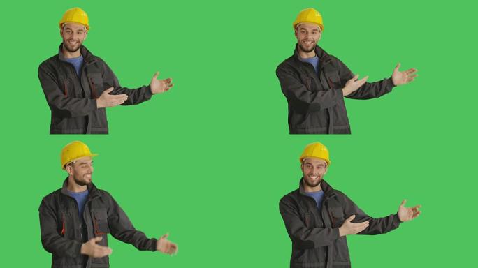 一个微笑的工人戴着安全帽做手势的镜头。背景是绿色屏幕。
