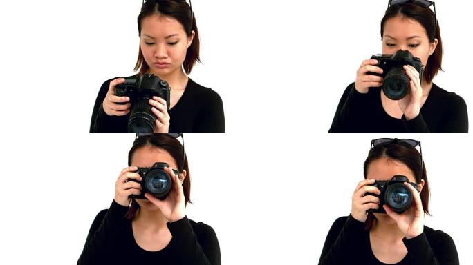 使用专业相机的亚洲女性