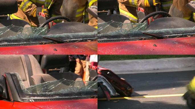 事故发生后，消防员在救援现场拆除失事汽车