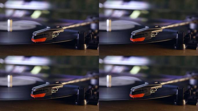 转盘触控笔降低到黑胶唱片，特写，在R3D上拍摄