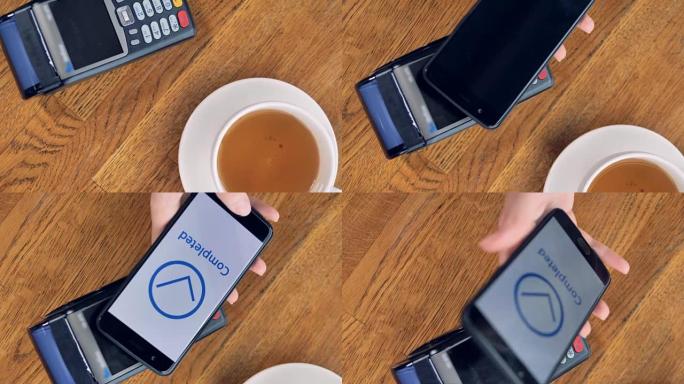 拿铁杯上的极端特写镜头，带有智能手机的NFC终端。