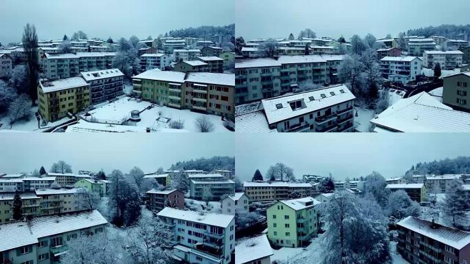 Arial shot of snow covered village in wintertime