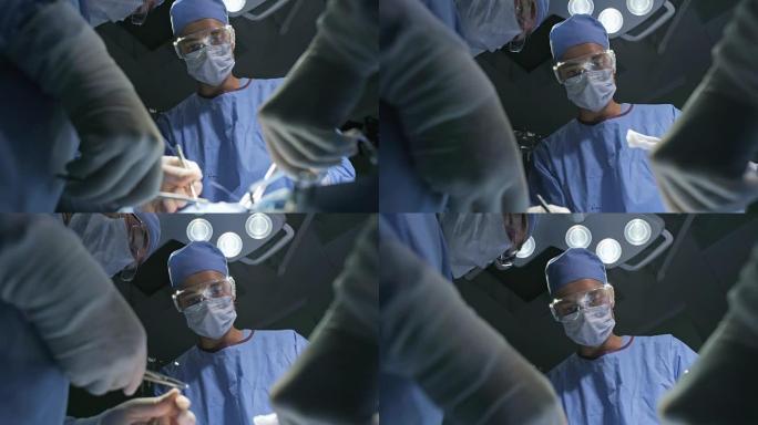 外科医生缝合切口