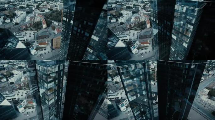 空中无人机拍摄玻璃摩天大楼。