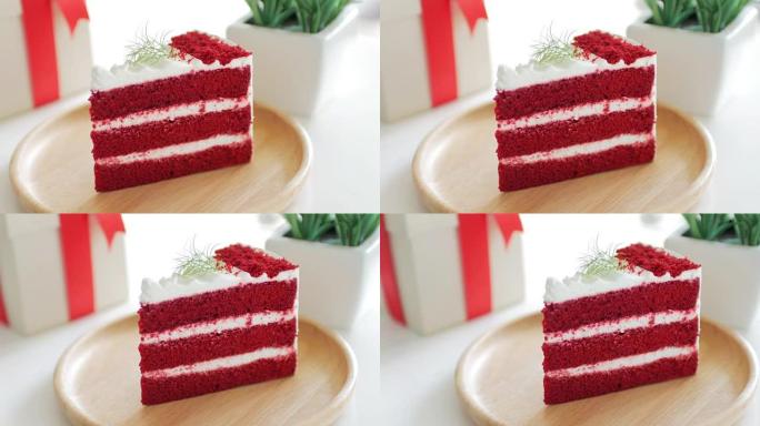 白色桌子上的木制盘子上的红色蛋糕草莓奶油蛋糕，多莉从右向左射击