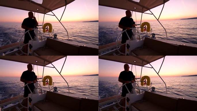 WS船长在日落时在海上航行帆船
