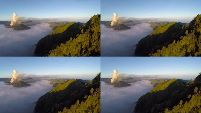 在日出时飞过布罗莫火山，位于印度尼西亚东爪哇的布罗莫腾格里国家公园的布罗莫火山的壮丽景色。