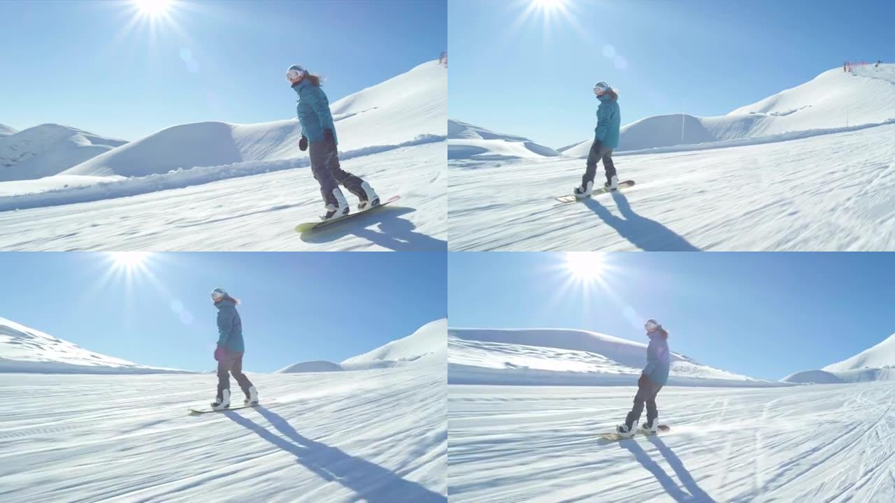 慢动作: 阳光明媚的女孩滑雪板