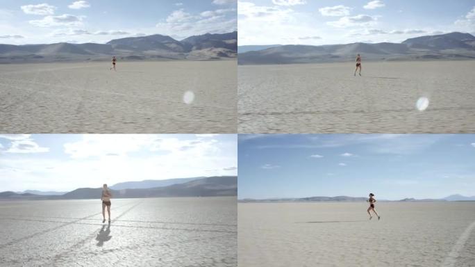 在沙漠中奔跑的女人面前穿越