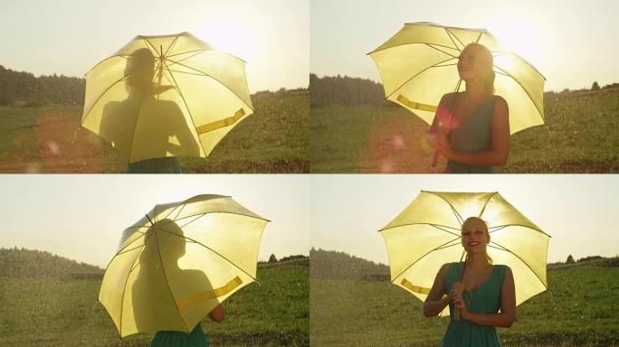 慢动作: 无忧无虑的金发女孩在她的黄色雨伞下在雨中旋转。