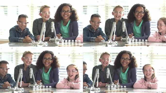 科学实验室中的四个多民族儿童