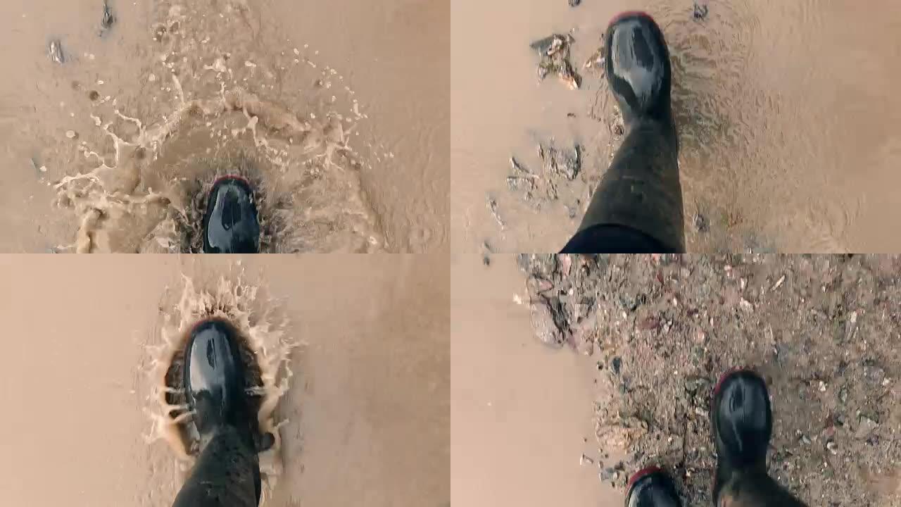 在水中行走的橡胶靴