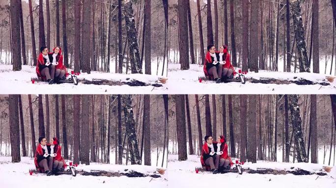 年轻的恋人，夫妇在冬季森林里玩得开心