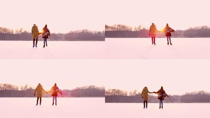 4k夫妇手牵手在阳光明媚、宁静的田园诗般的冰冻湖上滑冰，慢动作