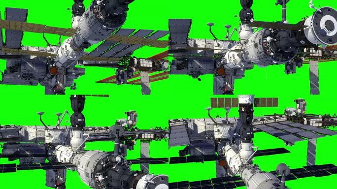 绕地球运行的国际空间站。绿屏。