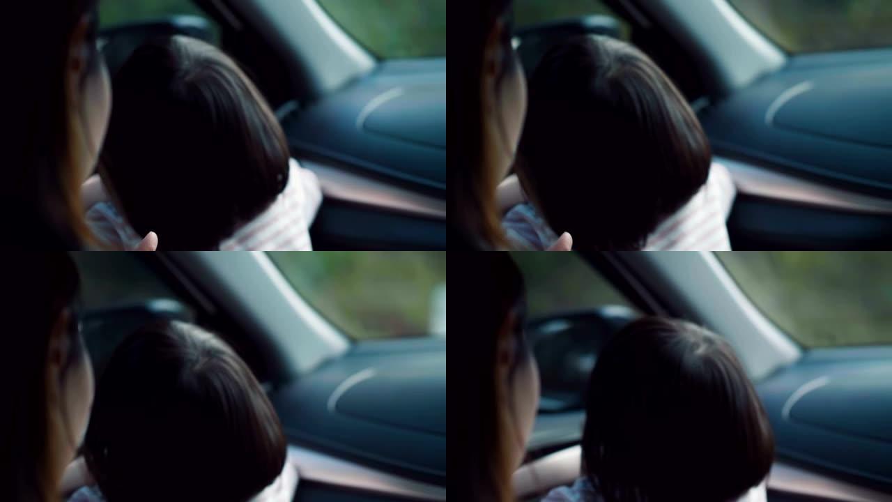 亚洲女婴黑色头发在汽车上