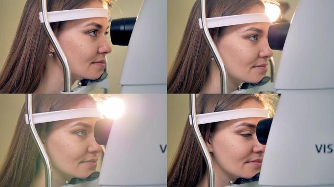 一个女人的头部在视网膜摄像机的下巴上的特写镜头。