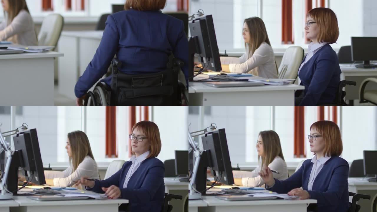 坐在轮椅上阅读文件的女性办公人员