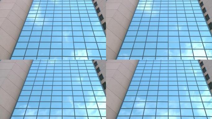 高清: 乌云掠过高楼大厦幕墙金融中心办公