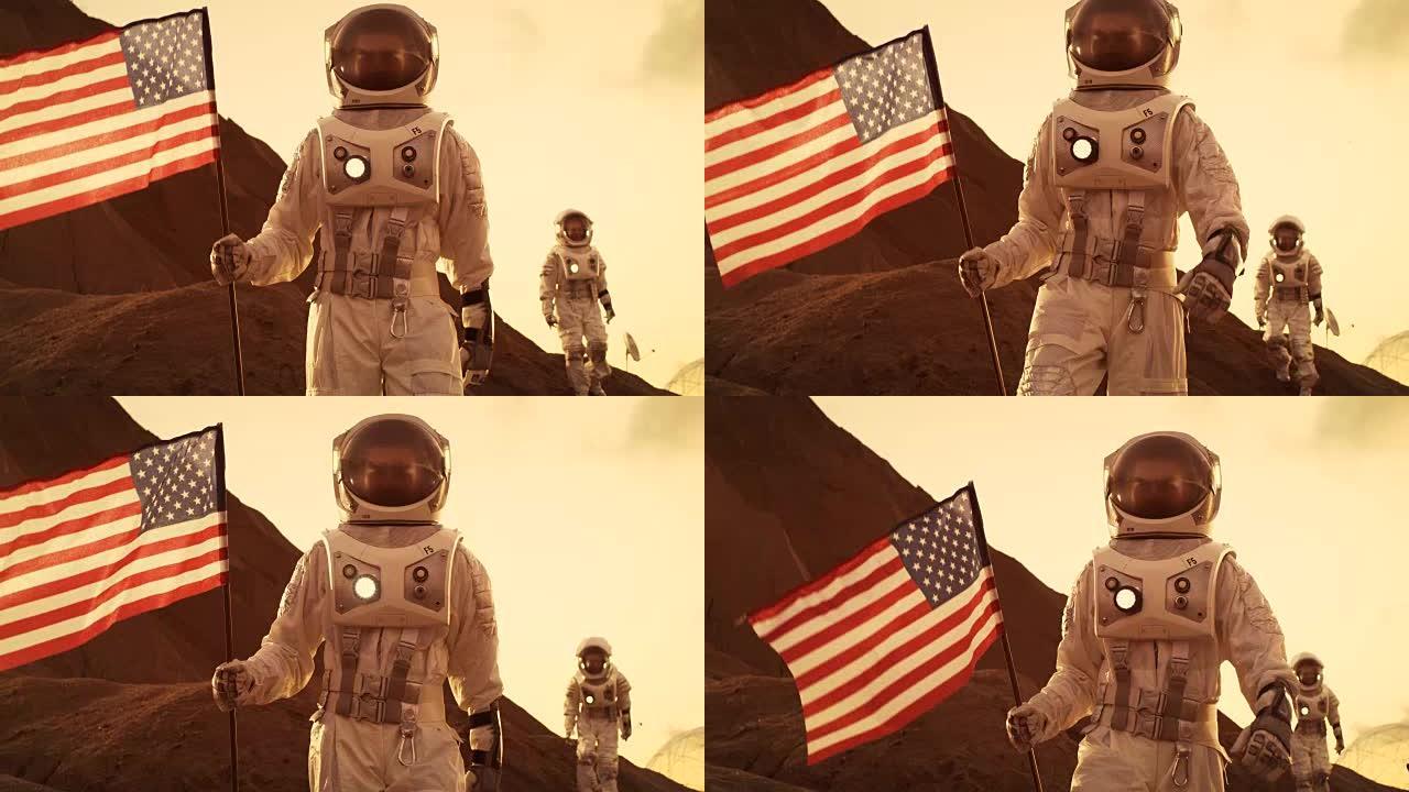 两名宇航员探索火星/红色星球。一名宇航员举着美国国旗。科技的进步带来了太空探索、旅行和殖民的概念。