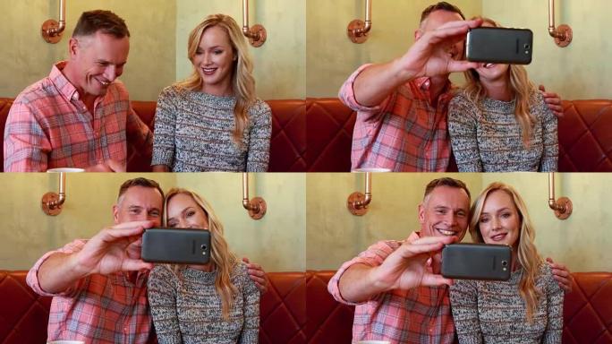 夫妇在4k餐厅用手机自拍