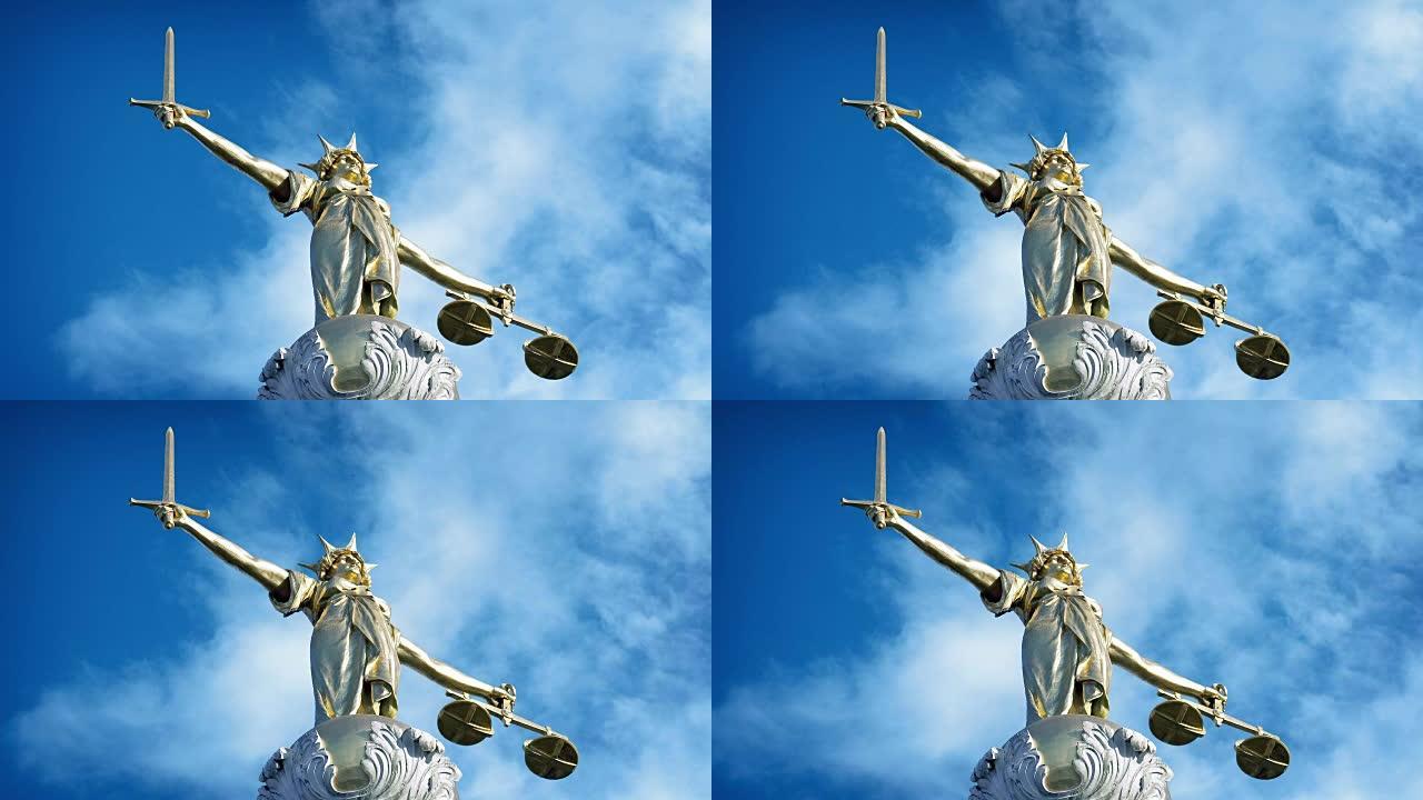 蓝天上的金色女神正义雕像