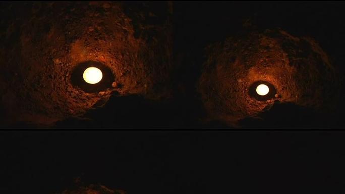 黑暗洞穴中的蜡烛