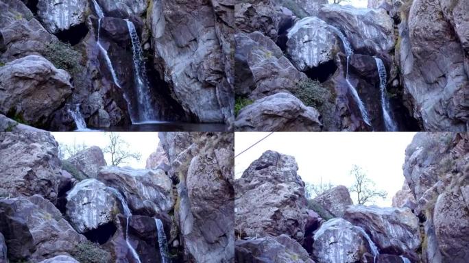 Waterfall surrounded by rocks