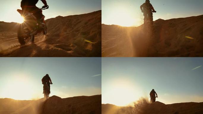 低角度跟踪拍摄的专业摩托车越野赛摩托车骑手驾驶越过沙丘和更远的越野轨道。这是《日落》，赛道上布满了烟