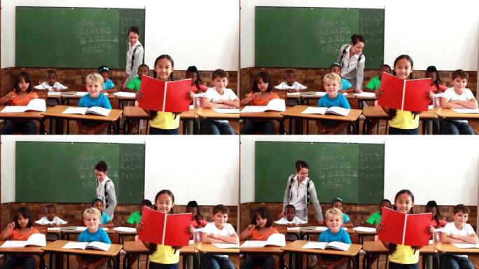 老师和学生在上课时都对着镜头微笑
