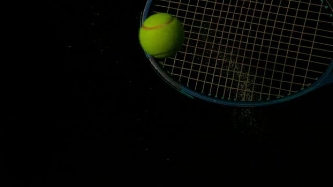 网球拍在黑色背景上击球