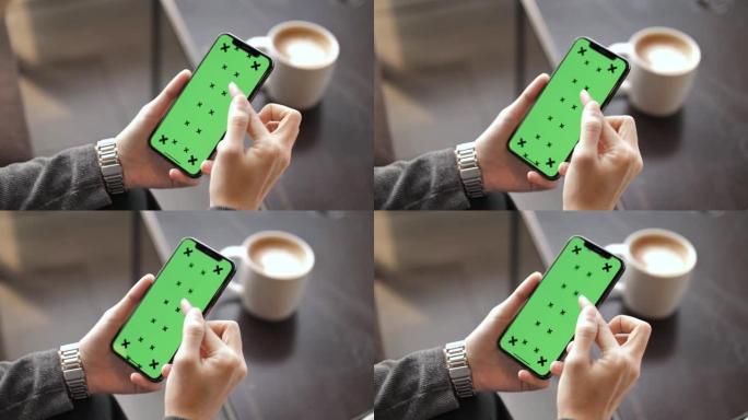 女人使用带有绿色屏幕的智能手机