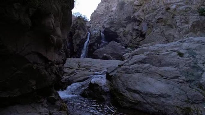 Waterfall surrounded by rocks