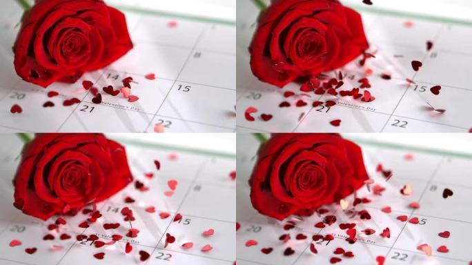 五彩纸屑落在红玫瑰和香菜上，显示情人节