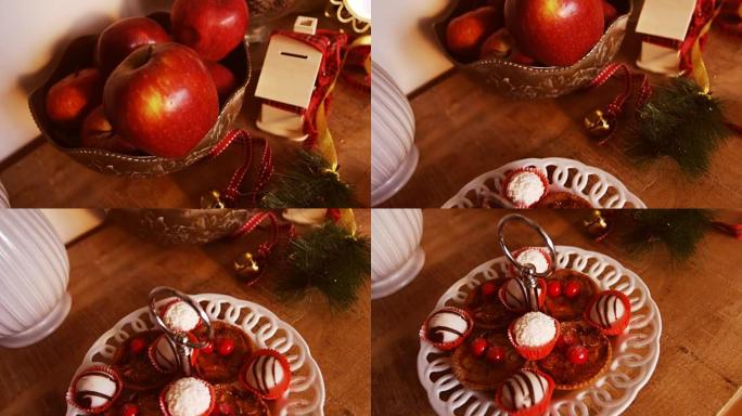 木制桌子上的各种圣诞甜点和装饰品