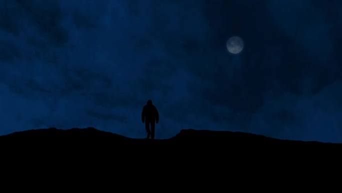 人类在月亮上方的山丘上行走