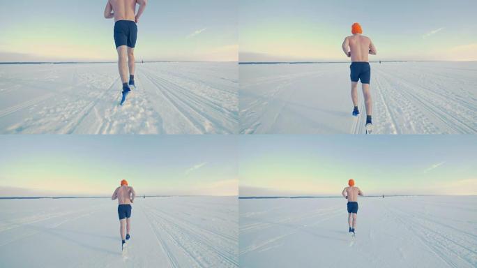 男人在冬天半裸着慢跑。